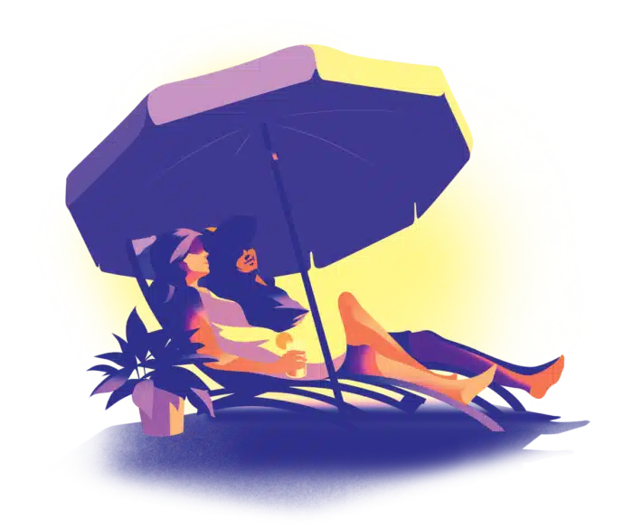 Couple sitting in beach chairs under an umbrella